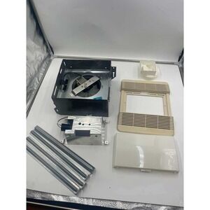 NuTone 663LN Bathroom Exhaust Fan with Light 50 CFM 2.5 Sones Brown Cream